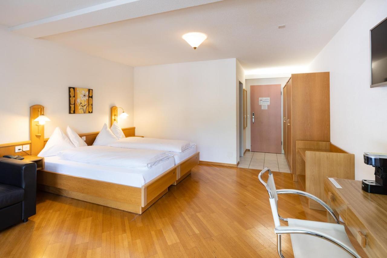 Strandhotel Seeblick Faulensee Exterior photo