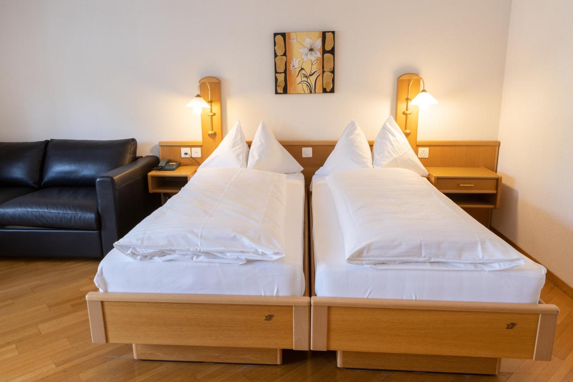 Strandhotel Seeblick Faulensee Exterior photo